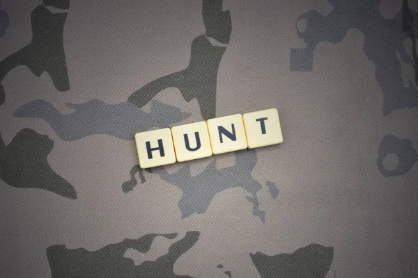 Letters with text hunt on the khaki background — Stock Photo, Image