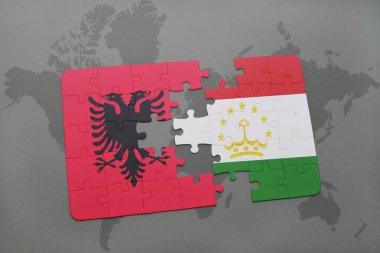 Arnavutluk ve Tacikistan Ulusal bayrak bir dünya haritası üzerinde ile bulmaca