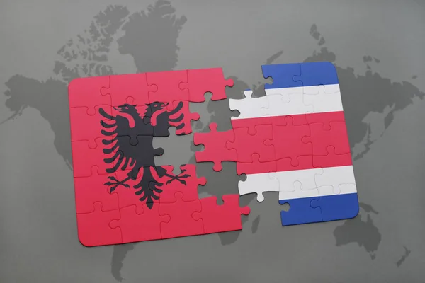 Παζλ με την εθνική σημαία της Αλβανίας και της Κόστα Ρίκα σε ένα παγκόσμιο χάρτη — Φωτογραφία Αρχείου