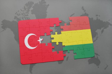 Türkiye ve Bolivya Ulusal bayrak bir dünya haritası üzerinde ile bulmaca