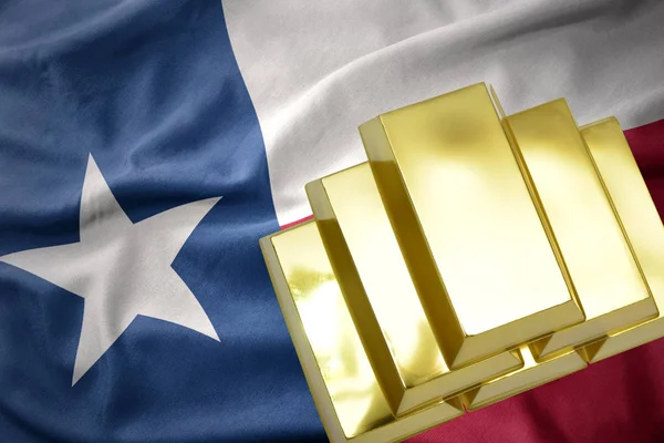 Shining golden bullions on the texas state flag — Stock Photo, Image