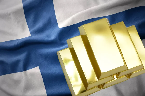 Shining golden bullions on the finland flag — Stock Photo, Image