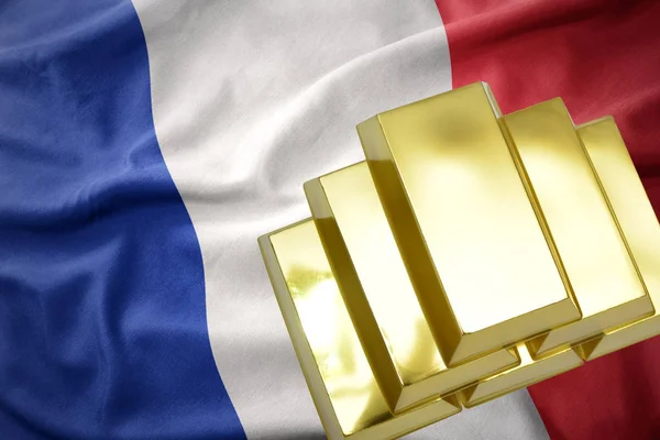 Сияющие золотые слитки на флаге Франции — стоковое фото