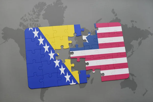 Puzzle con la bandiera nazionale di Bosnia ed Erzegovina e liberia su una mappa del mondo — Foto Stock
