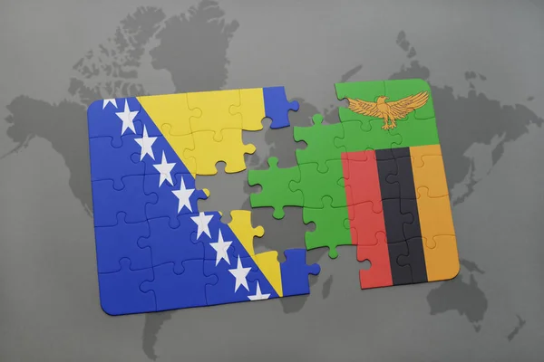 Puzzle con la bandiera nazionale di Bosnia ed Erzegovina e zambia su una mappa del mondo — Foto Stock