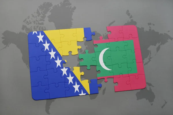 Παζλ με την εθνική σημαία της Βοσνίας και Ερζεγοβίνης και Μαλδίβες σε έναν παγκόσμιο χάρτη — Φωτογραφία Αρχείου