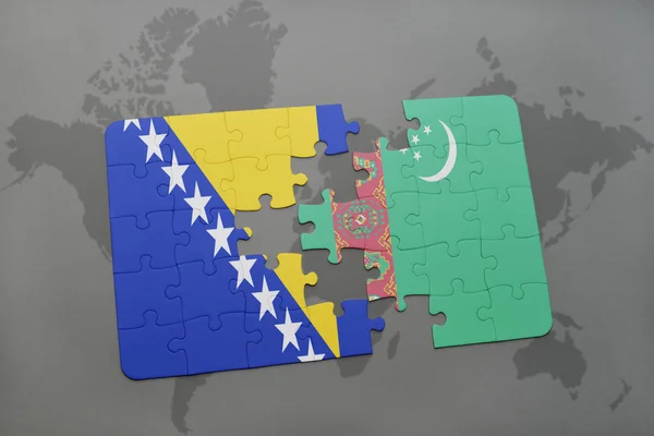 Puzzel met de nationale vlag van Bosnië en herzegovina en turkmenistan op een wereldkaart — Stockfoto