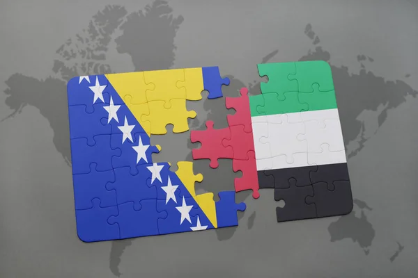 Rompecabezas con la bandera nacional de Bosnia y Herzegovina y emiratos árabes unidos en un mapa del mundo —  Fotos de Stock