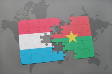 Lüksemburg ve burkina faso ulusal bayrak bir dünya haritası üzerinde ile bulmaca