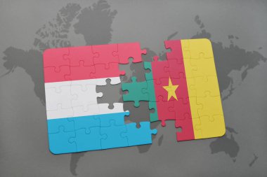 Lüksemburg ve Kamerun ulusal bayrak bir dünya haritası üzerinde ile bulmaca