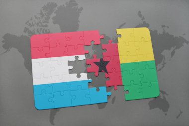 Lüksemburg ve Gine bayrağı ile bulmaca bissau bir dünya haritası üzerinde