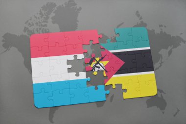 Lüksemburg ve Mozambik bir dünya haritası üzerinde bayrağı ile bulmaca