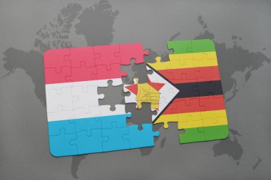 Lüksemburg ve Zimbabve Ulusal bayrak bir dünya haritası üzerinde ile bulmaca