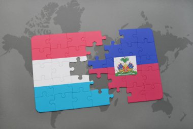 Lüksemburg ve haiti ulusal bayrak bir dünya haritası üzerinde ile bulmaca