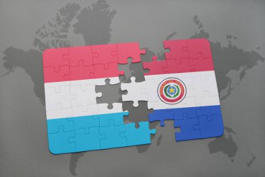 Lüksemburg ve paraguay ulusal bayrak bir dünya haritası üzerinde ile bulmaca