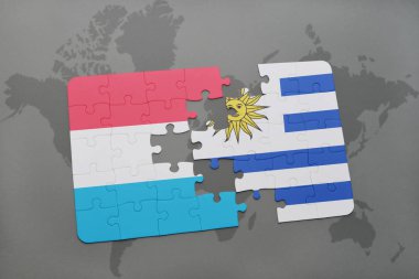 Lüksemburg ve uruguay ulusal bayrak bir dünya haritası üzerinde ile bulmaca