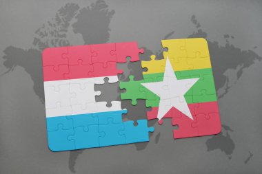 Lüksemburg ve myanmar ulusal bayrak bir dünya haritası üzerinde ile bulmaca
