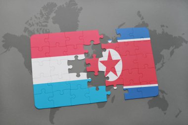 Lüksemburg ve Kuzey Kore ulusal bayrak bir dünya haritası üzerinde ile bulmaca