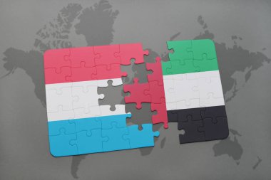 bir dünya haritası üzerinde Lüksemburg ve Birleşik Arap Emirlikleri bayrağı ulusal ile bulmaca