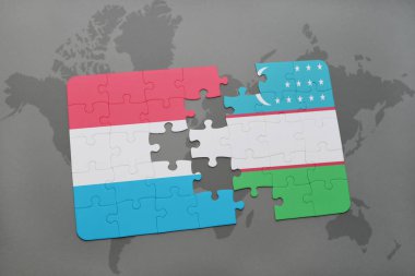 Lüksemburg ve Özbekistan'a bir dünya haritası üzerinde bayrağı ile bulmaca