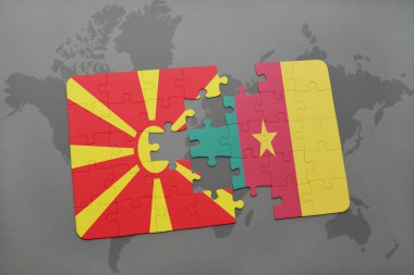 Makedonya ve Kamerun ulusal bayrak bir dünya haritası üzerinde ile bulmaca