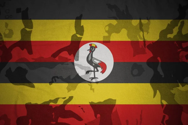 カーキ色のテクスチャにウガンダの旗。ミリタリー コンセプト — ストック写真