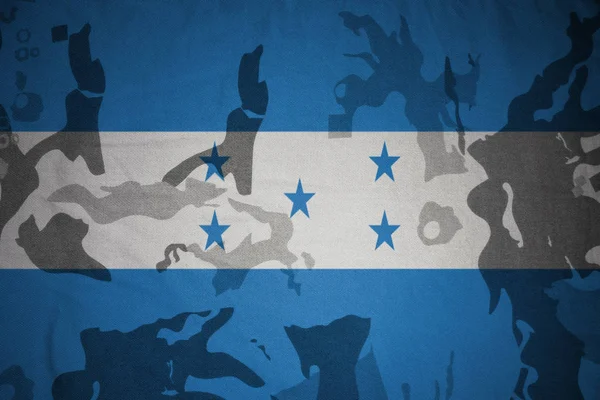 Bandera de honduras sobre la textura caqui. concepto militar — Foto de Stock