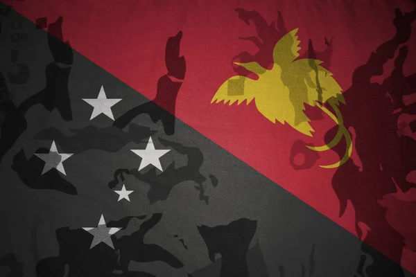 Flag of Papua New Guinea on the khaki texture . military concept — Stock Photo, Image