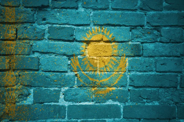 Malowane Flaga narodowa Kazachstanu na ceglany mur — Zdjęcie stockowe