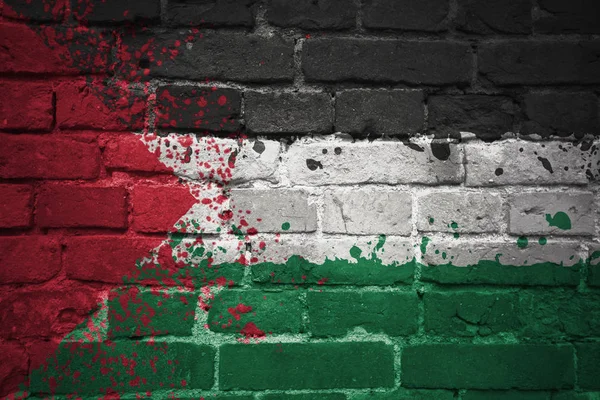 Bandeira nacional pintada de Palestina em uma parede de tijolo — Fotografia de Stock