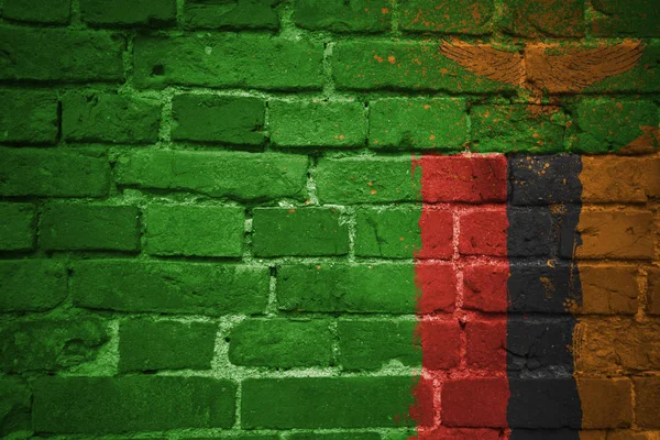 Bandeira nacional pintada de zâmbia em uma parede de tijolo — Fotografia de Stock