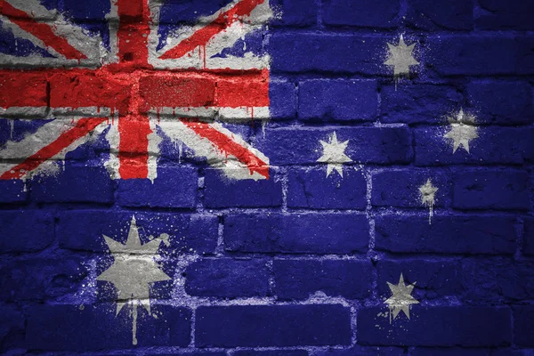 Bemalte australische Nationalflagge auf einer Ziegelwand — Stockfoto