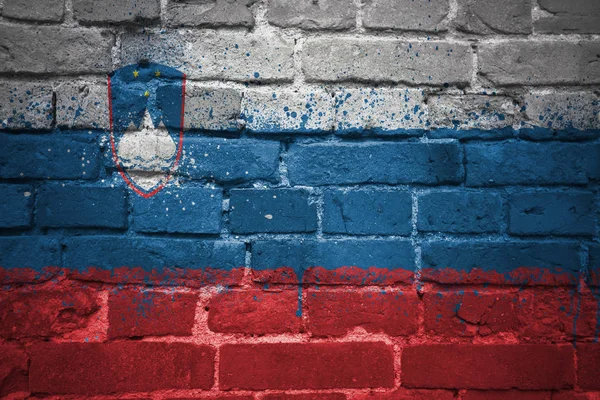 Painted national flag of slovenia on a brick wall — Stock Photo, Image