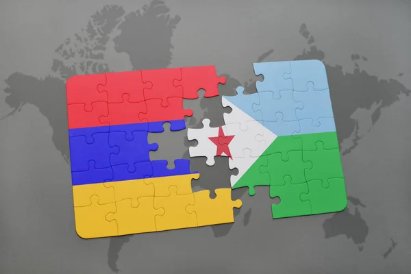 Puzzle avec le drapeau national de l'arménie et djibouti sur une carte du monde — Photo