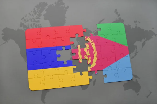 Puzzel met de nationale vlag van Armenië en eritrea op een wereldkaart — Stockfoto