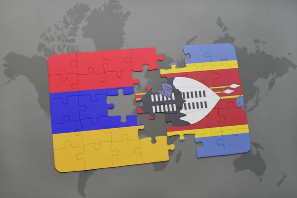 Puzzle com a bandeira nacional da Arménia e da Suazilândia num mapa mundial — Fotografia de Stock
