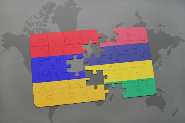 Puzzel met de nationale vlag van Armenië en mauritius op een wereldkaart — Stockfoto