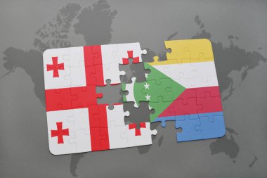 bir dünya haritası üzerinde Gürcistan ve Komor bayrağı ulusal ile bulmaca