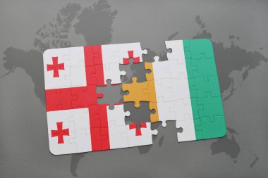 Gürcistan ulusal bayrak ile bulmaca ve Fildişi Sahili bir dünya haritası üzerinde