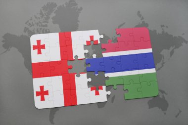 Gürcistan ve Gambiya ulusal bayrak bir dünya haritası üzerinde ile bulmaca