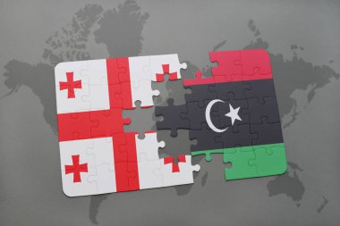 Gürcistan ve libya ulusal bayrak bir dünya haritası üzerinde ile bulmaca