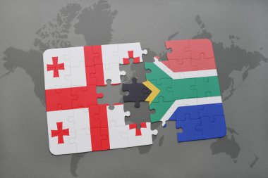 Gürcistan ve Güney Afrika ulusal bayrak bir dünya haritası üzerinde ile bulmaca