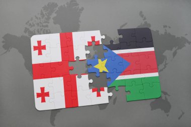 Gürcistan ve Güney sudan bir dünya haritası üzerinde ulusal bayrak ile bulmaca