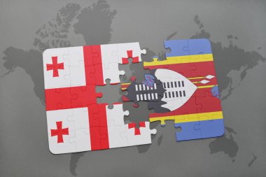 Gürcistan ve Svaziland ulusal bayrak bir dünya haritası üzerinde ile bulmaca