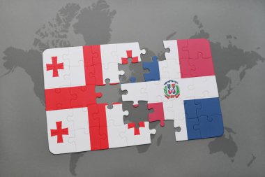 Gürcistan ve Dominik Cumhuriyeti ulusal bayrak bir dünya haritası üzerinde ile bulmaca