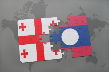 Gürcistan ve laos ulusal bayrak bir dünya haritası üzerinde ile bulmaca