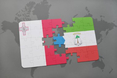 malta ve Ekvator Ginesi ulusal bayrak bir dünya haritası üzerinde ile bulmaca