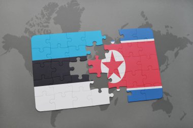 Estonya ve Kuzey Kore ulusal bayrak bir dünya haritası üzerinde ile bulmaca