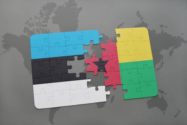 与爱沙尼亚和几内亚国旗拼图比绍在世界地图上 — 图库照片