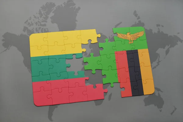 puzzle with the national flag of lithuania and zambia on a world map